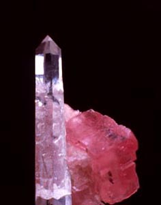 pink rhodochrosite upon quartz