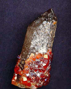 garnet spessartine upon quartz 