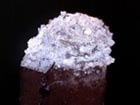 colorless hyalite  upon quartz crystals