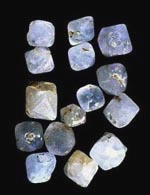 high-quartz  crystal in sand