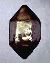 quartz bitumen carbon inclusions